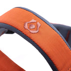 Close-up of an orange and gray strap with a pink embroidered logo on a white background