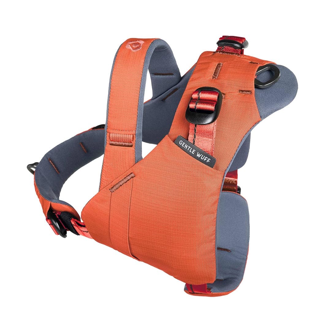 Orange and gray dog harness with 'Gentle Wuff' label on a white background