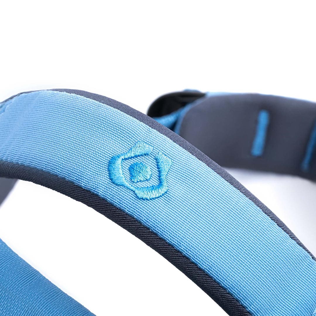 Close-up of a blue and gray headband with a logo on a white background