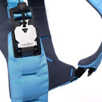 Close-up of a blue and black climbing harness with Fidlock brand visible.