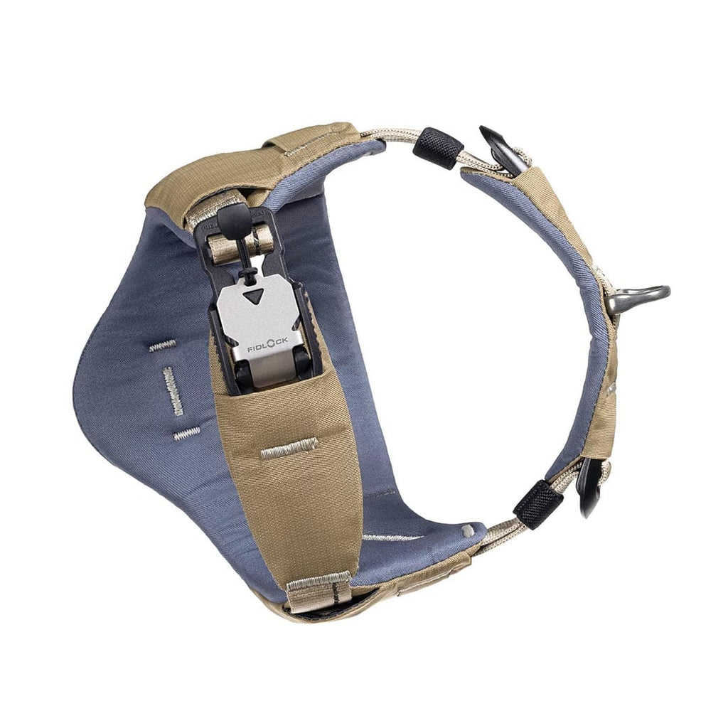 Dog harness with blue back and beige straps on a white background