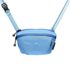 Light blue waist bag with a strap on a white background